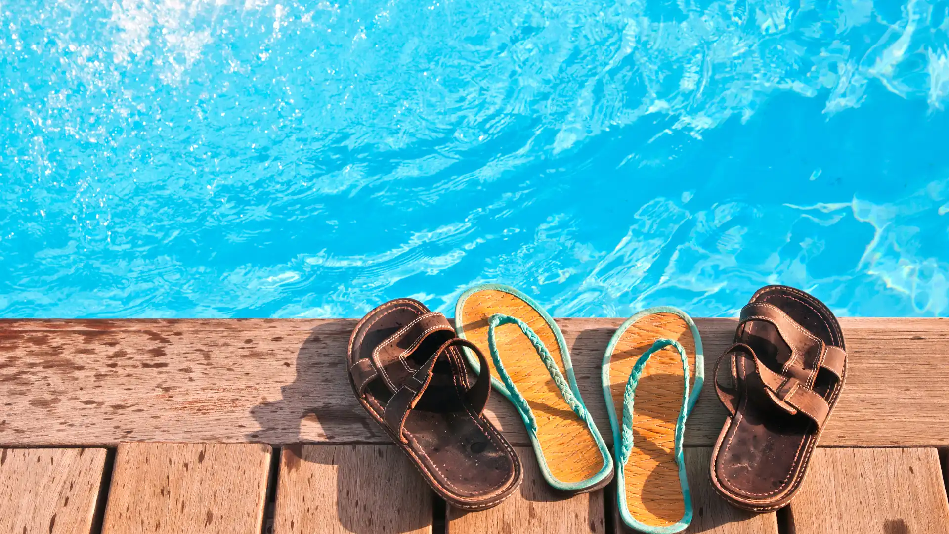 How long does it take to heat a pool – Sandals beside a pool